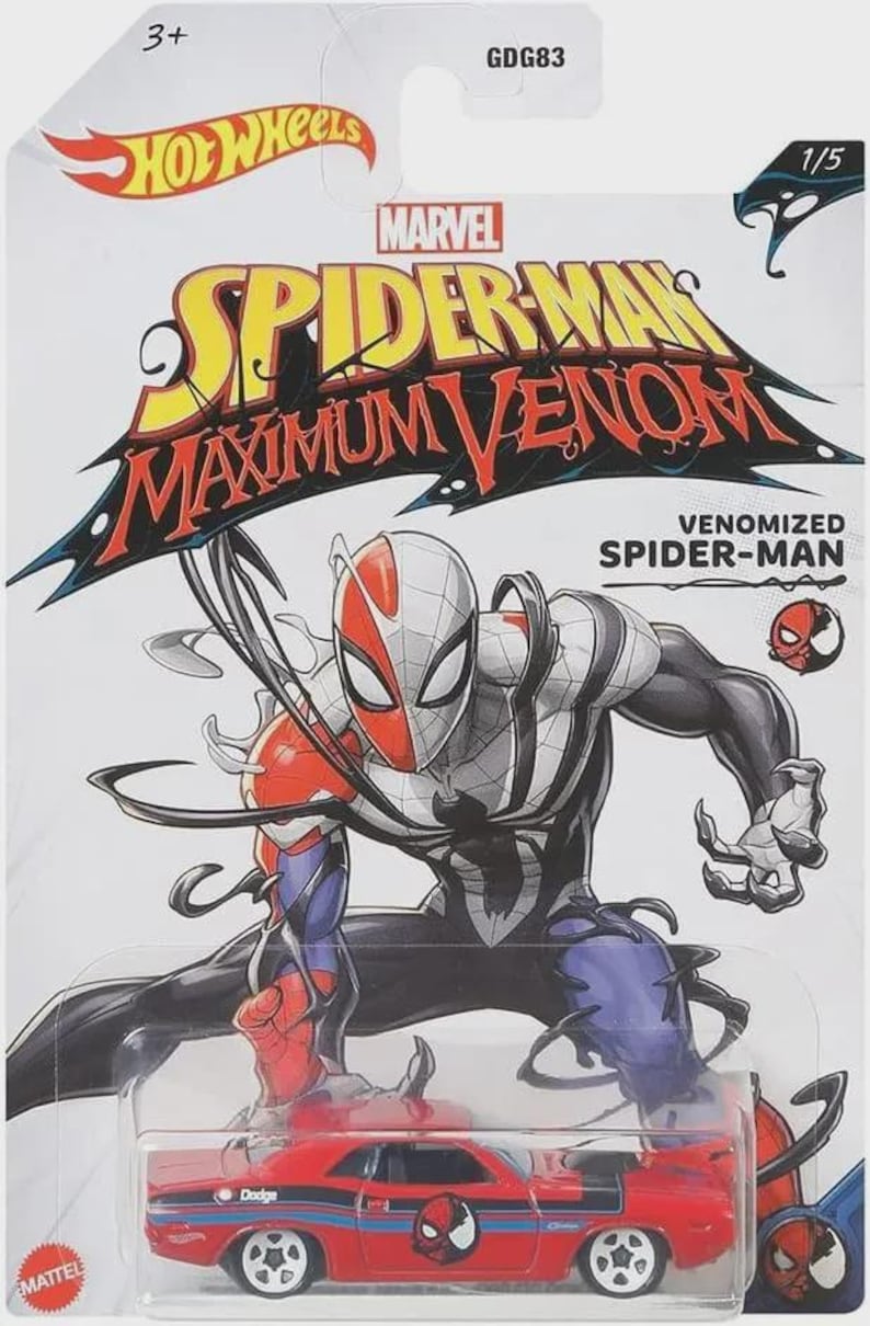 May include: Hot Wheels toy car featuring a red Dodge Challenger with Spider-Man graphics. The packaging includes the Marvel and Hot Wheels logos, along with a Venomized Spider-Man illustration. The car is part of the Maximum Venom series.