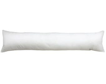 May include: A long, white body pillow. The pillow is rectangular and filled, with a soft, smooth texture. The pillow is designed for comfort and support, and is a solid white color.