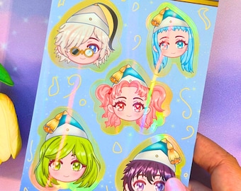 May include: A light blue sticker sheet featuring five chibi-style character heads wearing pointed hats with tassels. The characters have distinct hair colors including white, blue, pink, green, and purple. The sheet includes the text ASTERUMI.CO.