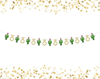May include: A green and gold cactus and ring garland for a bridal shower or wedding party decoration. The garland is made of paper and has a string for hanging.