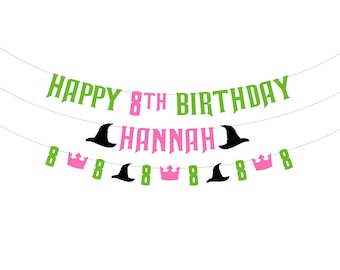 May include: Green and pink banner with the text "Happy 8th Birthday Hannah" and black witch hats and crowns.