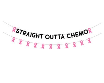May include: A pink ribbon banner with the text "STRAIGHT OUTTA CHEMO" in black letters. The banner is strung with pink ribbons.