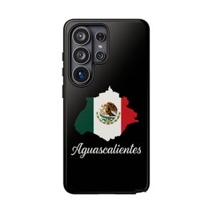 May include: Black phone case featuring the state of Aguascalientes, Mexico, with the Mexican flag's colors and emblem. The state's name is written in a cursive font at the bottom. The case has a camera module on the top left.