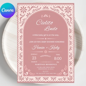 May include: A pink baby shower invitation with the text "Cielito Lindo" and "A little baby girl is on the way." The invitation includes details for Hansin and Kady's baby shower, including the date, time, and location. The design features floral and decorative elements.