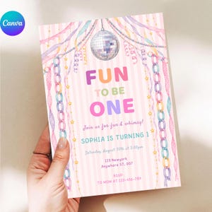 Puede incluir: Una tarjeta de invitación rectangular con fondo de rayas rosas claras y blancas. Presenta una bola de discoteca, cadenas de papel coloridas y guirnaldas de estrellas. El texto dice: FUN TO BE ONE, Join us for fun & whimsy!, SOPHIA IS TURNING 1, Saturday, August 30th at 3:00pm, 123 Newyork, Anywhere ST, 007, RSVP TO MOM AT 123-456-789.