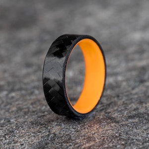 Diagonal Carbon Fiber Ring with a Orange Glow Core