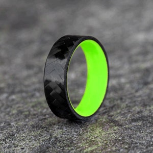 Diagonal Carbon Fiber Ring with a Green Glow Core