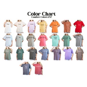 May include: A color chart displays various Comfort Colors 1717 t-shirts in a variety of colors, including white, ivory, orchid, yellow, orange, red, chambray, bay, sandstone, watermelon, mint, green, grey, moss, blue spruce, pepper, periwinkle, wine, and espresso.