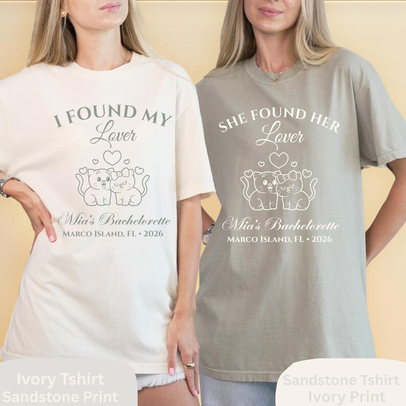May include: Two t-shirts, one ivory and one sandstone, with matching ivory print. The ivory shirt reads "I FOUND MY Lover" with a cat graphic and "Mia's Bachelorette MARCO ISLAND, FL &bull; 2026". The sandstone shirt reads "SHE FOUND HER Lover" with the same graphic and text.
