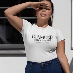 May include: A set of three ceramic mugs with a speckled, matte finish. The mugs are in shades of cream, light gray, and dark gray. Each mug has a simple, minimalist design, perfect for coffee or tea.