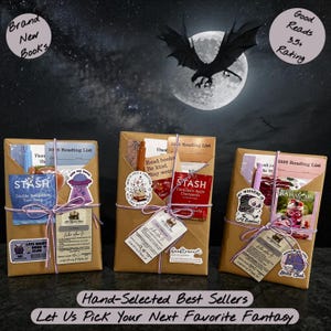 May include: Three wrapped book bundles with stickers and tags, tied with purple twine. Each bundle contains tea packets and a reading list. The background features a moon, a bat, and text that reads "Hand-Selected Best Sellers" and "Let Us Pick Your Next Favorite Fantasy."