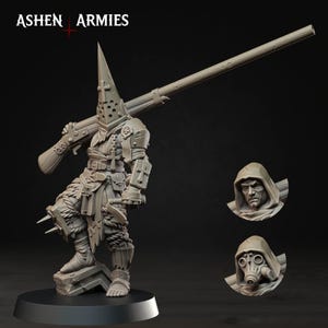 May include: A detailed, gray miniature figure of a warrior in armor, carrying a large rifle. The figure has a pointed helmet with a cross, and the text "ASHEN ARMIES" is visible. Two additional head sculpts are included.