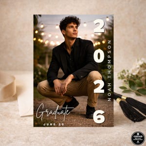 May include: Graduation announcement featuring a young man in a black blazer and khaki pants, with the text "Graduate" and "June 20". The year "2026" and the name "Noah Thompson" are also displayed. The background includes string lights.