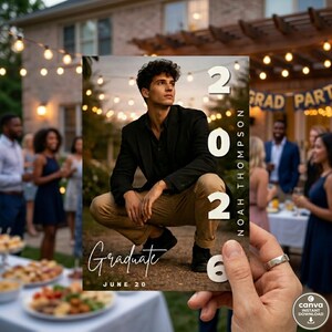 May include: A graduation announcement card held in a hand, featuring a young person in a black blazer and khaki pants. The card displays the year "2026", the name "Noah Thompson", and the word "Graduate" with the date "June 20".
