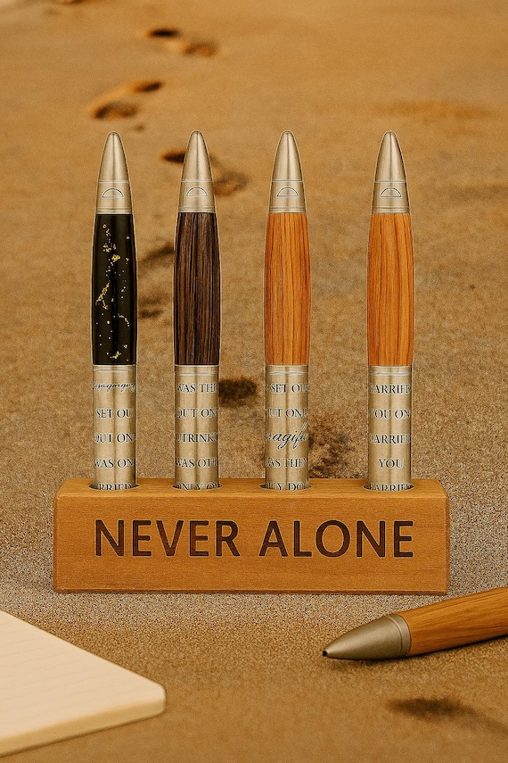 Foot Prints in the Sand pens made with olivewood from Bethlehem.  Reminder that you never walk alone.