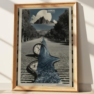May include: Framed surreal art print in a light wood frame. The artwork depicts a road scene with a clock and a river flowing through it. The word "SURREAL" is printed at the top of the image.