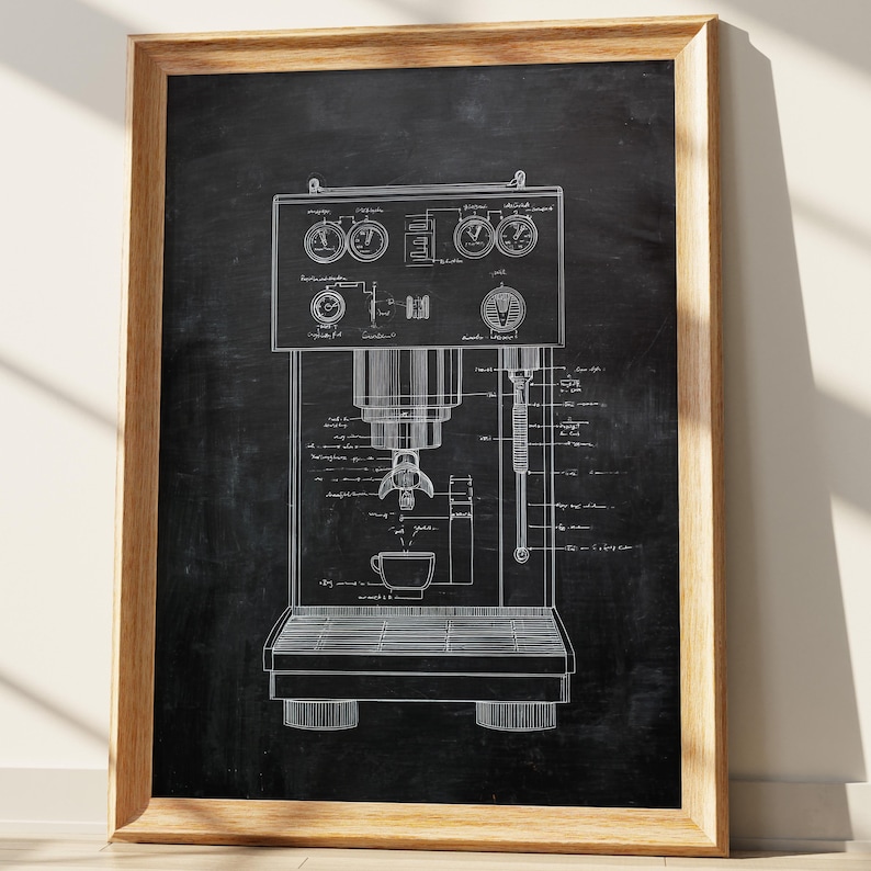 May include: A framed print featuring a detailed blueprint of an espresso machine. The design is rendered in white lines against a dark background, showcasing the machine's components, gauges, and a cup. The frame is made of wood.