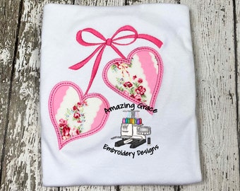 Diseño de apliques de corazones de lazo