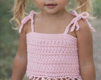 Size 2 Girls Pink Boho Crochet Top. pom-pom style hem. Crochet ties.