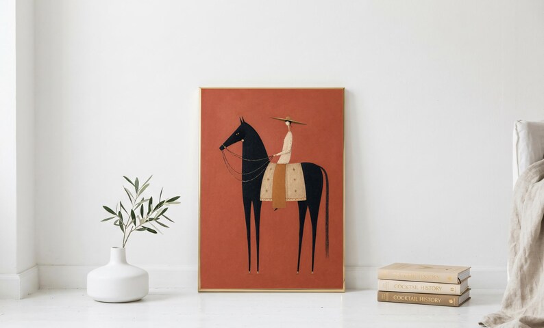 Folk art print of a figure in a wide-brim hat riding a tall dark horse with a tan saddle blanket on a warm terracotta background, vertical mid century equestrian wall art.
