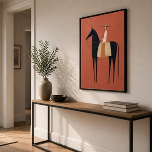 Folk art print of a figure in a wide-brim hat riding a tall dark horse with a tan saddle blanket on a warm terracotta background, vertical mid century equestrian wall art.