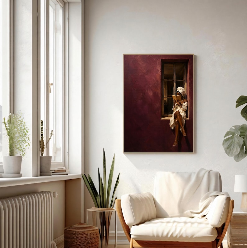 Painting of a Black woman in a white towel reading a golden book on a sunlit windowsill against a deep burgundy wall, moody figurative wall art print.