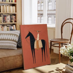 Folk art print of a figure in a wide-brim hat riding a tall dark horse with a tan saddle blanket on a warm terracotta background, vertical mid century equestrian wall art.