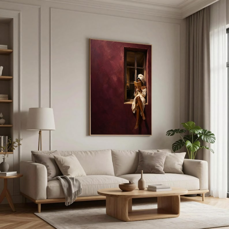 Painting of a Black woman in a white towel reading a golden book on a sunlit windowsill against a deep burgundy wall, moody figurative wall art print.
