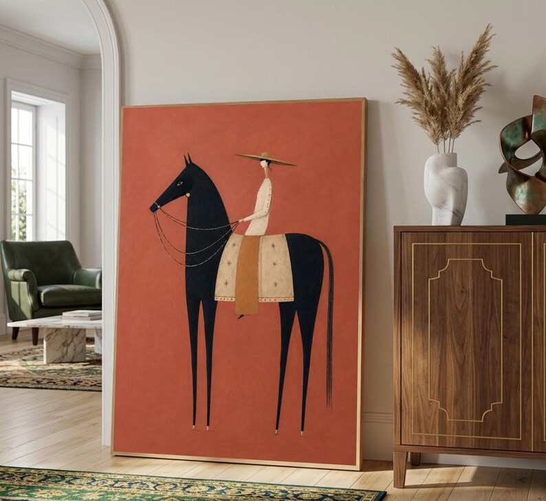Folk art print of a figure in a wide-brim hat riding a tall dark horse with a tan saddle blanket on a warm terracotta background, vertical mid century equestrian wall art.