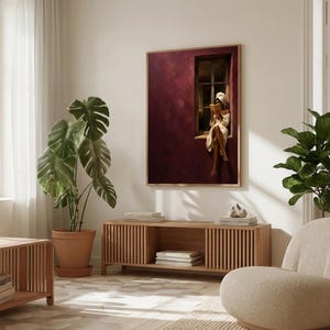Painting of a Black woman in a white towel reading a golden book on a sunlit windowsill against a deep burgundy wall, moody figurative wall art print.