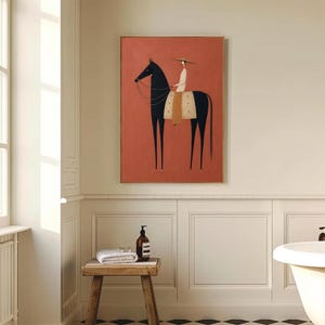 Folk art print of a figure in a wide-brim hat riding a tall dark horse with a tan saddle blanket on a warm terracotta background, vertical mid century equestrian wall art.
