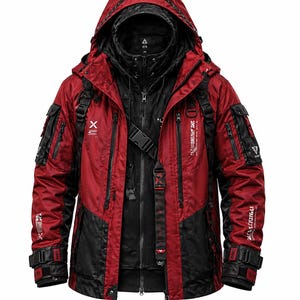May include: A red and black hooded jacket with multiple pockets and straps. The jacket features a layered design with a black inner layer and a red outer shell. The hood is adjustable, and the jacket has text details on the sleeves.