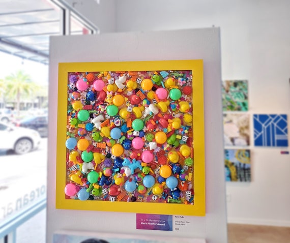 Original Mixed Media Plastic Toys Embedded in Resin on Wood Board
