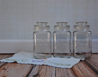 Vintage Anchor Hocking Clear Glass Fleur de Lis Canisters, sold individually