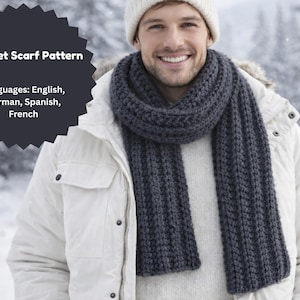 May include: A man wearing a dark gray crocheted scarf and a white beanie. The scarf is wrapped around the neck and chest. The image includes the text "Crochet Scarf Pattern" and lists English, German, Spanish, and French as available languages.