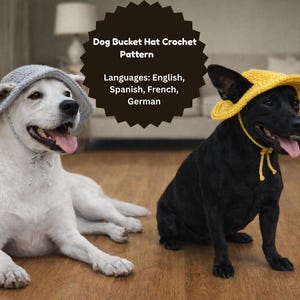 May include: Two dogs wearing crochet bucket hats. One dog is white and wearing a light grey hat with a string tie. The other dog is black and wearing a yellow hat with a yellow string tie. The image includes text that says "Dog Bucket Hat Crochet Pattern".