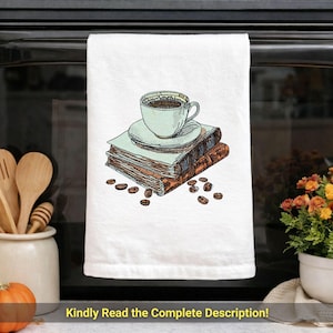 May include: White kitchen towel with an embroidered design of a coffee cup on a saucer atop two books, with scattered coffee beans. The design is in shades of brown, blue, and white. The text at the bottom reads "Kindly Read the Complete Description!"