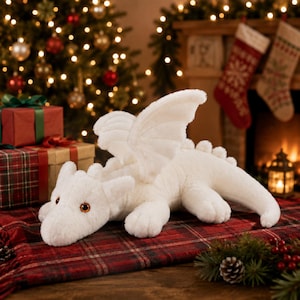 May include: A plush white dragon toy with soft fur, prominent wings, and amber-colored eyes. The creature is depicted in a quadrupedal stance with a long tail, textured back ridges, and small horns on its head, crafted from a fuzzy material.