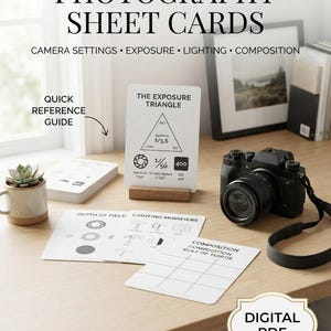 May include: A set of white photography sheet cards featuring black text and diagrams for camera settings, exposure, lighting, and composition. One card displays The Exposure Triangle, while others show Depth of Field and Rule of Thirds.