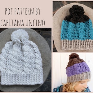 May include: Three crocheted hats with different coloured stripes and pom-poms. The hats are white, teal and purple with brown accents. The hats are on a wooden surface. PDF PATTERN BY CAPITANA UNCINO.