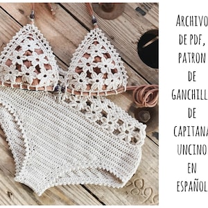 May include: Crochet bikini top and bottom pattern in Spanish. The pattern is for a crochet bikini top and bottom with a floral design. The pattern is written in Spanish.