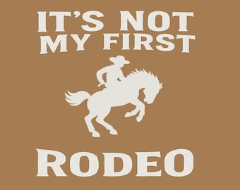 Camiseta "Não é meu primeiro rodeio" engraçada, estilo faroeste, ideal para cowboys e cowgirls.