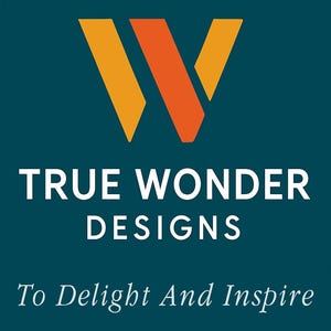 May include: A teal background with the words "TRUE WONDER DESIGNS" in white, and a stylized orange and yellow "W" logo. Below the text is the phrase "To Delight And Inspire" in a cursive font.