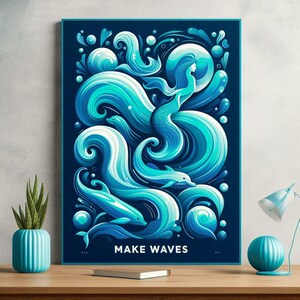 May include: A framed art print depicting a mermaid and dolphins amidst stylised ocean waves in shades of blue and turquoise. The words "MAKE WAVES" are printed in white at the bottom. The print is displayed on a wooden surface.