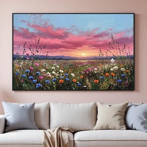 Puede incluir: Una taza de cerámica blanca con un asa negra y el texto "But First, Coffee" en negro, con una fuente de estilo manuscrito. La taza está sobre una superficie blanca.