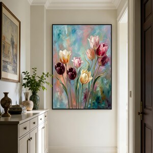 May include: A large framed painting of tulips in various colors, including deep burgundy, yellow, and pink, against a soft blue and green background. The artwork is displayed on a white wall in a well-lit hallway.