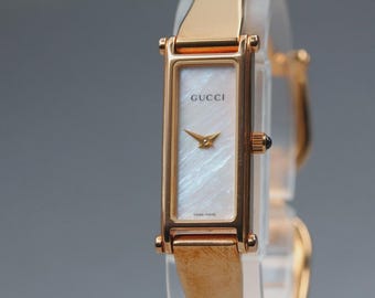 GUCCI 1500L Shell Dial Gold 12mm Bangle Quartz Women's Watch Rectangle JAPAN