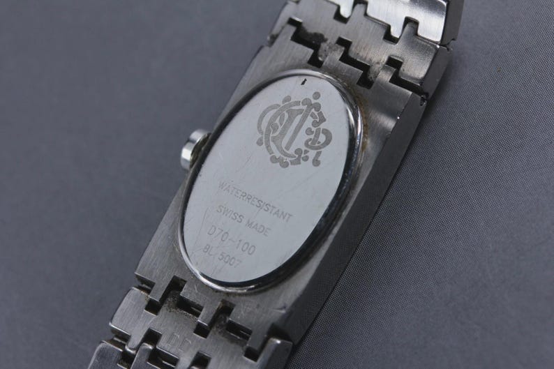 Montre pour femme Christian Dior D70-100 avec cadran argenté et quartz Authentique [presque état neuf] image 7