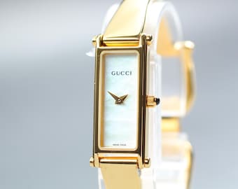 GUCCI 1500L Shell Dial Gold 12mm Bangle Quartz Women's Watch [Near MINT]