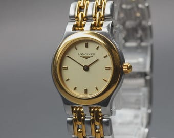 Montre pour femme LONGINES L7.147.3 24 mm cadran doré à quartz vintage [presque PARFAITE]
